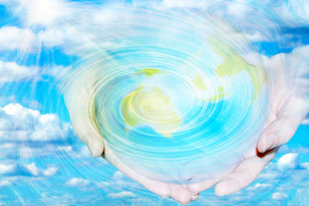 abstract background with curl in hand of the person on background sparkling skyの写真素材
