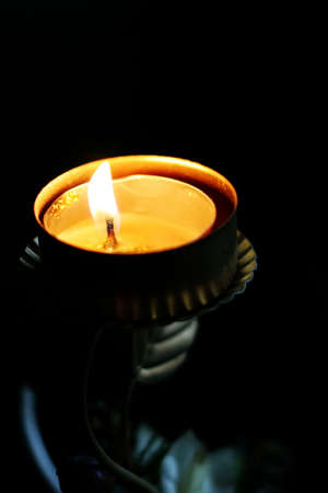 solitary burning candle