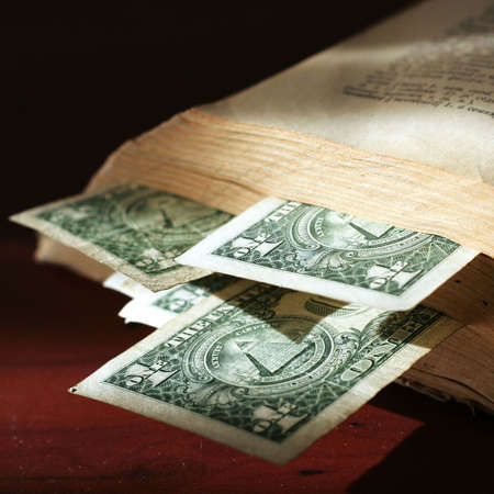 old paper bills and aging bookの写真素材