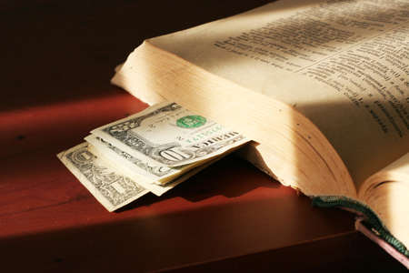 old paper bills and aging bookの写真素材