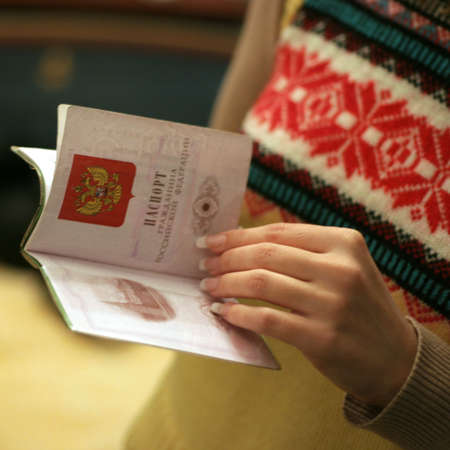 passport in hand of the girlの写真素材