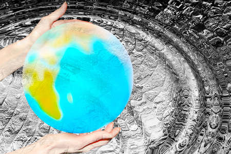 abstract scene of the planet in feminine handの写真素材