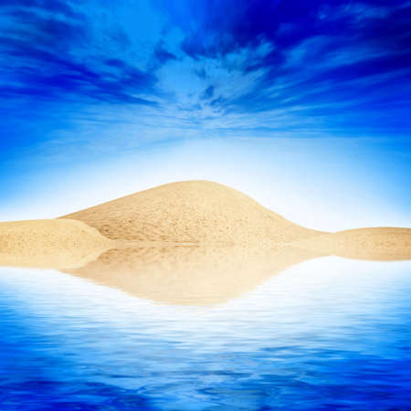 abstract reflection in water of the sandy landscape and solar skyの写真素材