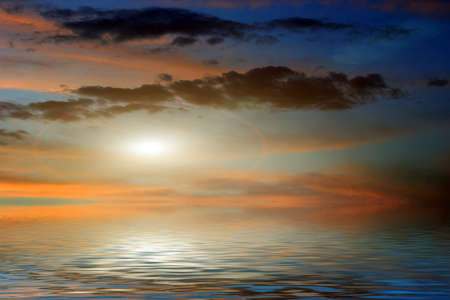 reflection solar sky in surfaces of waterの写真素材