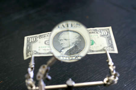 american dollars in adjustment for increase the part of subjectの写真素材