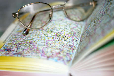 abstract scene spectacles on page geographical atlasの写真素材