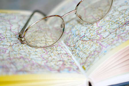 abstract scene spectacles on page geographical atlasの写真素材