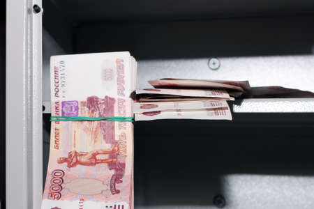 scene banknotes on shelf safeの写真素材