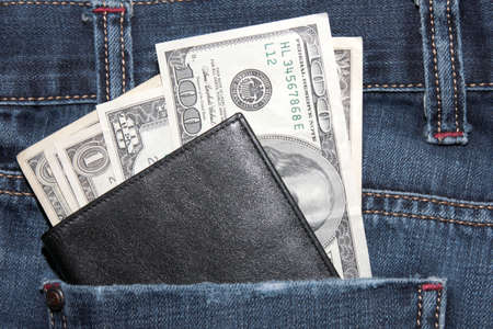 dollar in black wallet