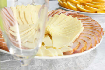 slices cheese and piece brisket as part festive menuの写真素材