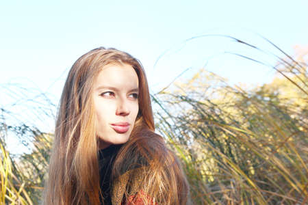 beautiful girl makes walk in the forest