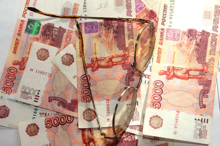 scene several thousand rouble and old spectacles for correcting the visionの写真素材