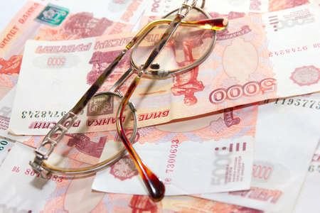 scene several thousand rouble and old spectacles for correcting the vision