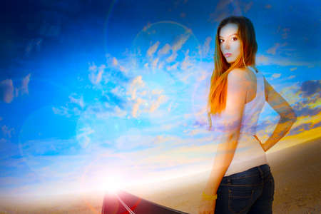 abstract portrait cheerful girl on fantasy backgroundの写真素材