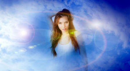 abstract portrait cheerful girl on fantasy backgroundの写真素材