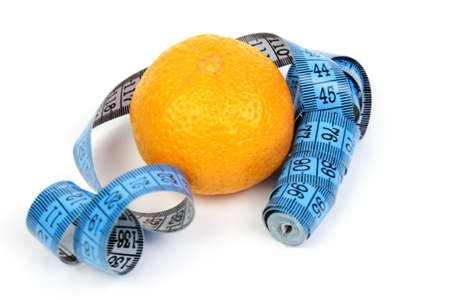 scene beautiful ripe tangerine and measure tape の写真素材