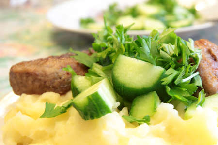 roasted chop and boiled potatoes with decoration parsleyの写真素材