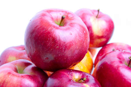 fresh ripe tangerine and apple as symbol harvestの写真素材