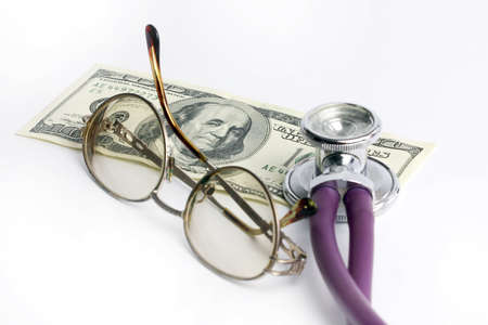 stethoscope doctor and dollars as illustration pay medicineの写真素材
