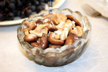 pickled mushrooms in crystal cup as part festive dinner