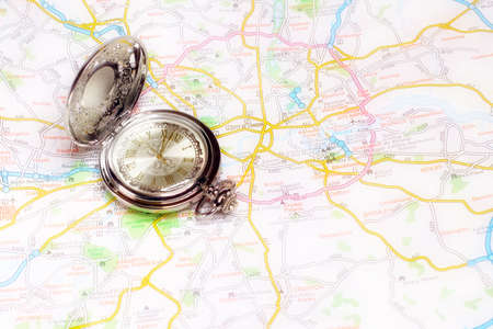 exact watch and geographical map as element choice directions journey