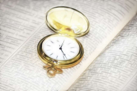 old watch and page book as element reception knowledgesの写真素材