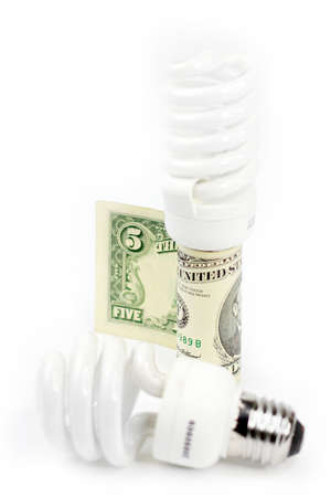 saving energy lamp and paper bill dollarの写真素材