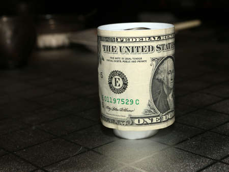 label with the image of dollar on a tin foodの写真素材