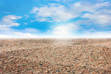 surface of the sea beach with a pile of sand and skyの写真素材