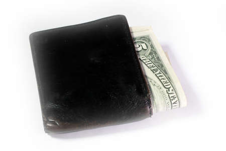 Shallow paper dollars are in a black purse