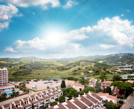 beautiful mountain landscape with meadow and sunny skyのeditorial素材