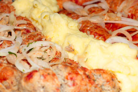 tasty grilled meat and potatoesの写真素材