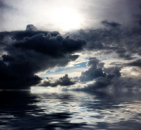 a beautiful clear sky and the water surface of the oceanの写真素材