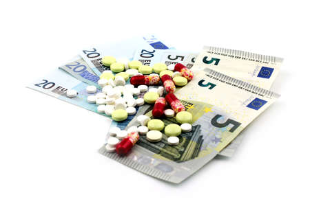 euro paper money and pills as a paid medicineの写真素材