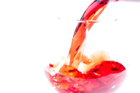 Beautiful drops and splashes of wineの写真素材