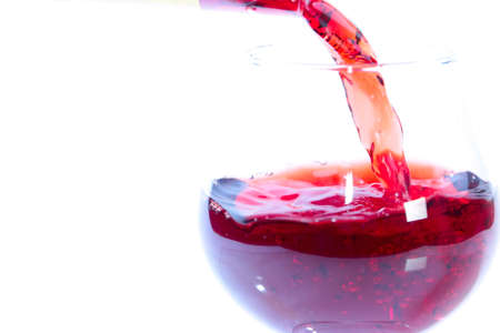 Beautiful drops and splashes of wineの写真素材
