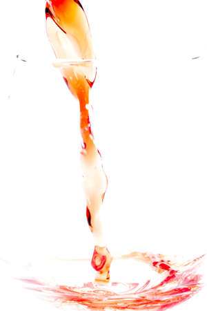 Beautiful drops and splashes of wineの写真素材