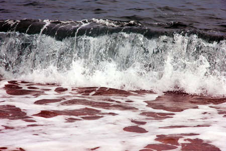 fine sand and a sea wave