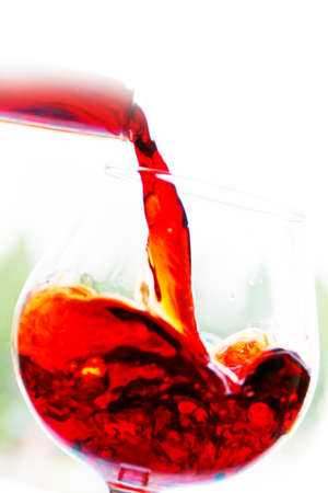 fine patterns present red wine into a glass