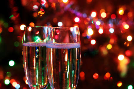 glasses of wine in a festive Christmas decorationの写真素材