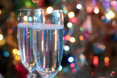 glasses of wine in a festive Christmas decorationの写真素材
