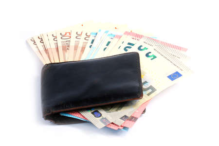 paper euro banknotes in old leather purse