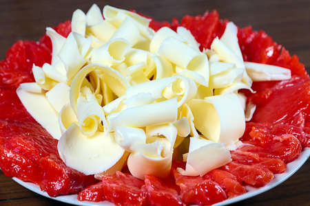 slices of delicious salmon and butter on a plateの写真素材