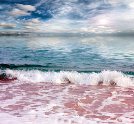 sandy beach of the Mediterranean Sea and the beautiful skyの写真素材