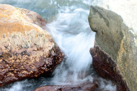 wild cliffs and rocky shore beautiful oceanの写真素材