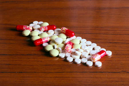 medicine drugs and tablets with pills as the arsenal of treating doctorの写真素材
