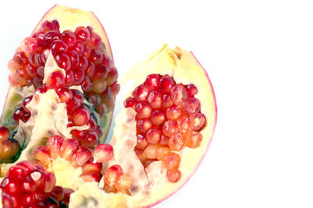beautiful ripe tropical fruit pomegranate has beneficial vitaminsの写真素材