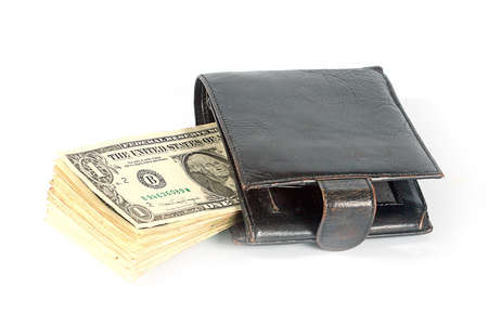 pile of banknotes dollars in leather purse