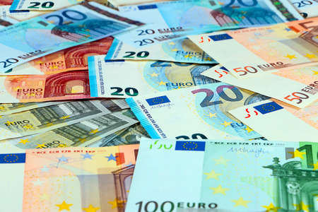 pile of paper euro banknotes as part of the united country's payment systemの写真素材