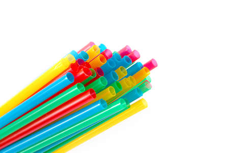 pile of plastic cocktail straws to consumption of drinks